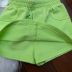 Conjunto Infantil Feminino Momi Blusa Off-White Gripper Shorts Saia Verde Neon