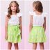 Conjunto Infantil Feminino Momi Blusa Off-White Shorts Saia Verde Neon Flores Bordadas