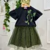 Conjunto Infantil Feminino Momi Preto e Verde Blusa Cropped Manga Babado Shorts Saia POA