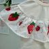 Conjunto Infantil Momi Blusa Off-White Estampa Joaninha Morango Saia-Shorts Floral