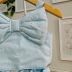 Conjunto Infantil Pituchinhus Blusa Azul Em Algodão Lisa Maxi Laço Strass Shorts Liso Laço Strass