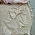 Conjunto Infantil Yoyo Blusa Rosê Ursinhas Laço Shorts Off-White Bolsos Laço Strass Pérolas