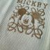 Regata Infantil Animê Nude Canelada Bordado Dourado Mickey Aplic. Detalhe Dourado