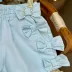 Short Infantil Yoyo Azul Celeste Pérolas Laços