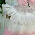 Vestido Infantil de Festa Petit Cherie Off-White Sobrep. Tule Rosa Lilás Brilho Aplic. Paetê Coração