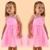 Vestido Infantil de Festa Petit Cherie Rosa Neon Sobrep. Tule Brilho Alcinha e Lacinhos Strass