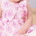 Vestido Infantil Momi Off-White Flores Bordadas Rosa Neon