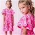 Vestido Infantil Momi Pink Neon Morangos com Recortes e Manga Flutuante