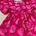 Vestido Infantil Momi Pink Neon Morangos com Recortes e Manga Flutuante